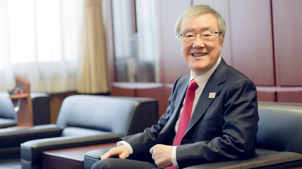 出口 治明